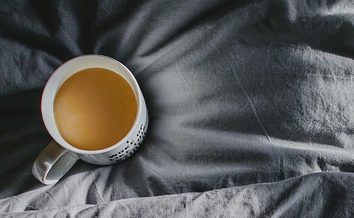 remove stains from sheets - image of coffee cup on sheets