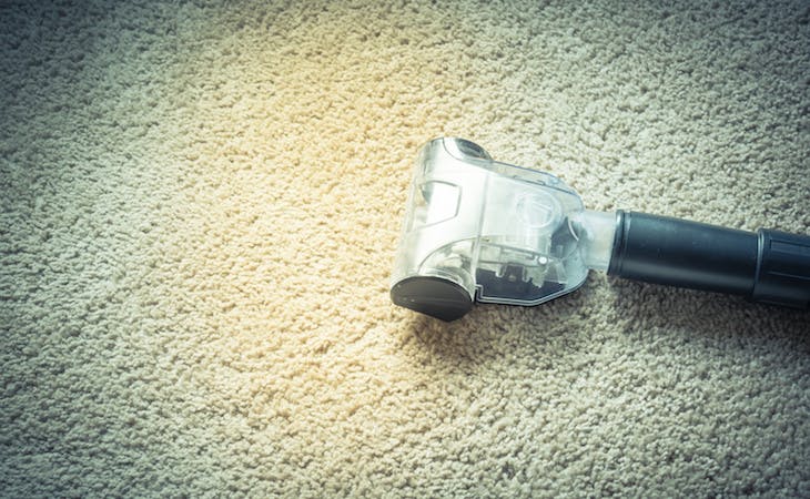 allergy-proof bedroom - image of vacuum cleaner on carpet