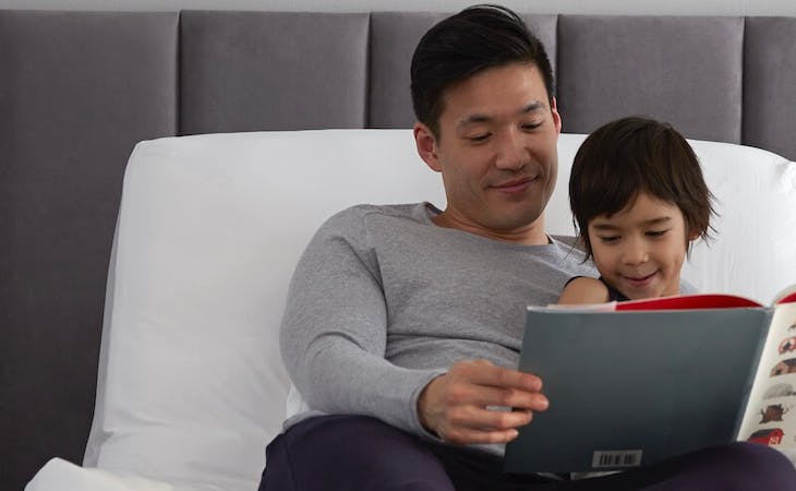 Person reading story to child