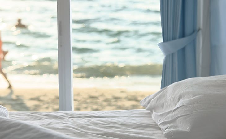 image of bed in summer rental