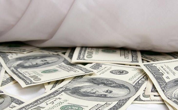 mattress financing - image of money under bed