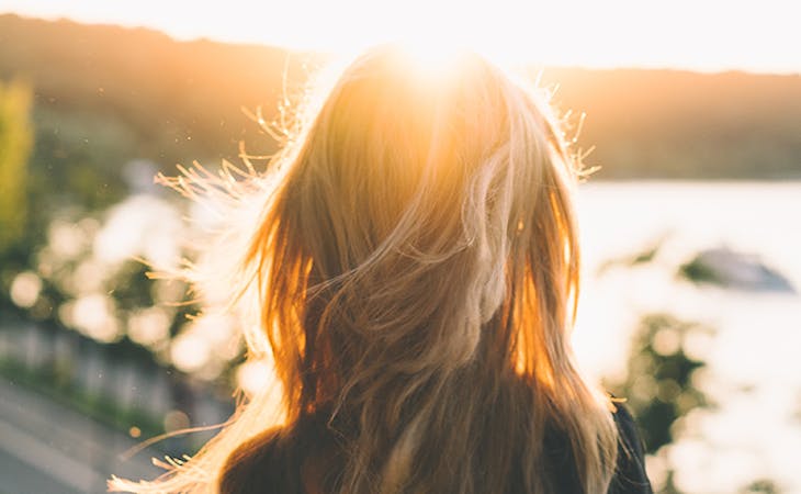 summer sunshine and sleep - image of woman outside in sun