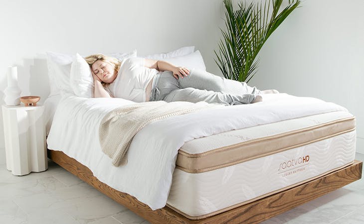 sleep tips for heavy people - image of woman lying on mattress