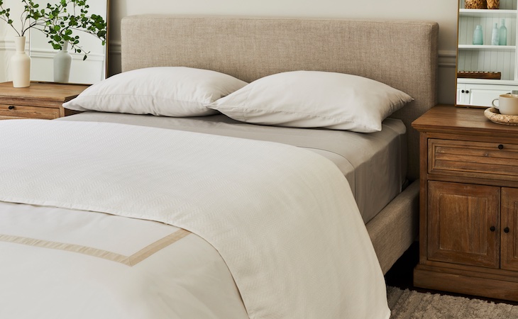 What Is a Fitted Sheet, and How Is It Different From a Top Sheet?