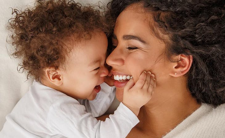 image of new mom in bed with baby