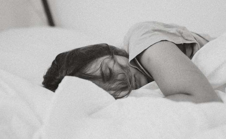 image of woman sleeping in bed