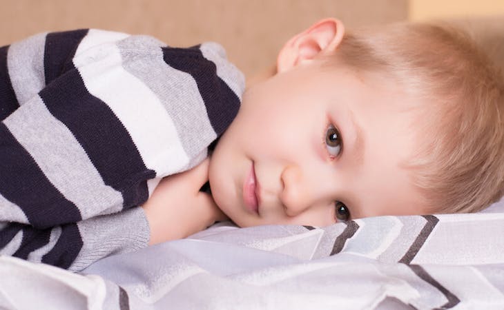 image of sleepy child in bed