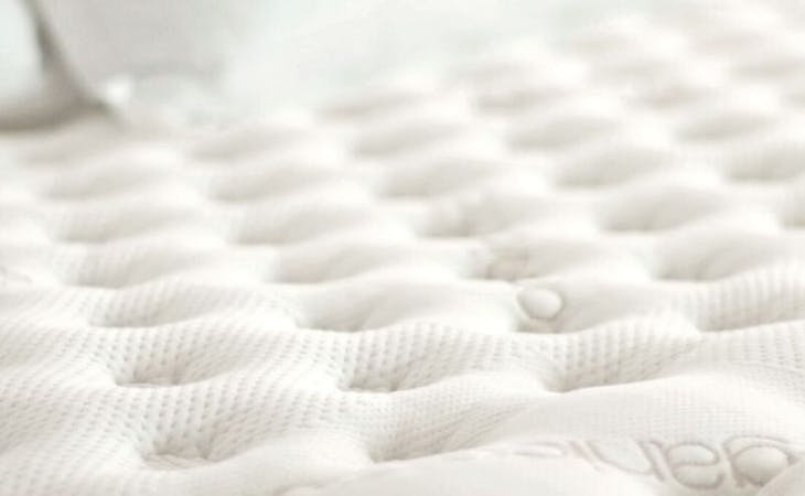 mattress firmness scale - image of saatva mattress