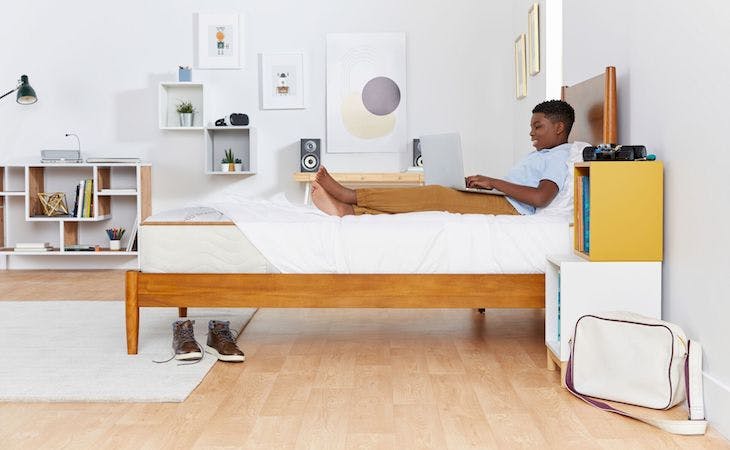 person rotating a mattress