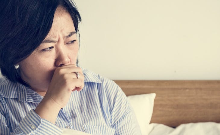 image of person with nighttime cough in bed