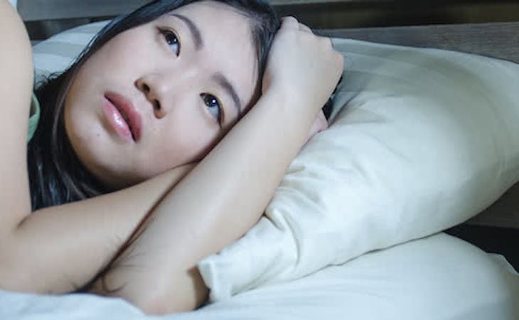 person awake in middle of the night from nightmares
