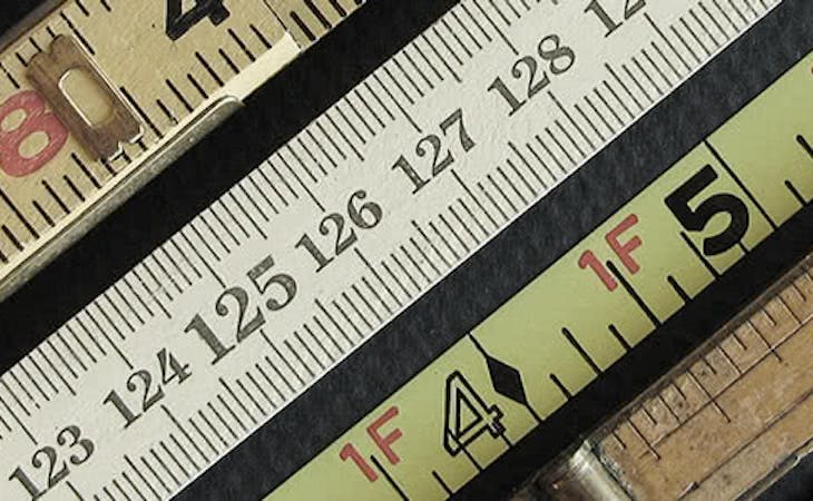 bunch of rulers to use to measure mattress sizes