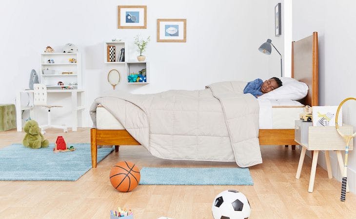 twin bed dimensions - child sleeping in twin size bed