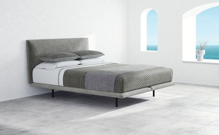 image of saatva mattress on mattress foundation