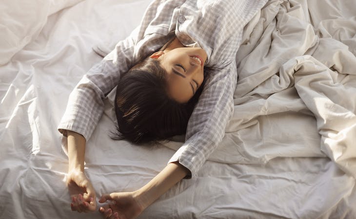 person getting quality sleep in bed