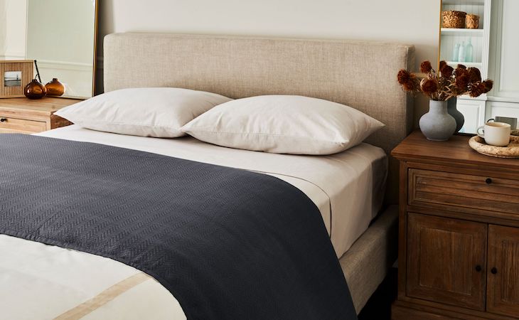 saatva herringbone blanket on top of bed