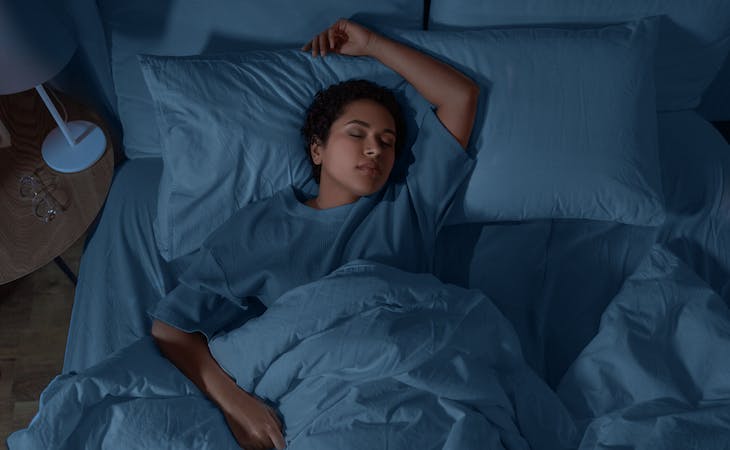 person sleeping in bed