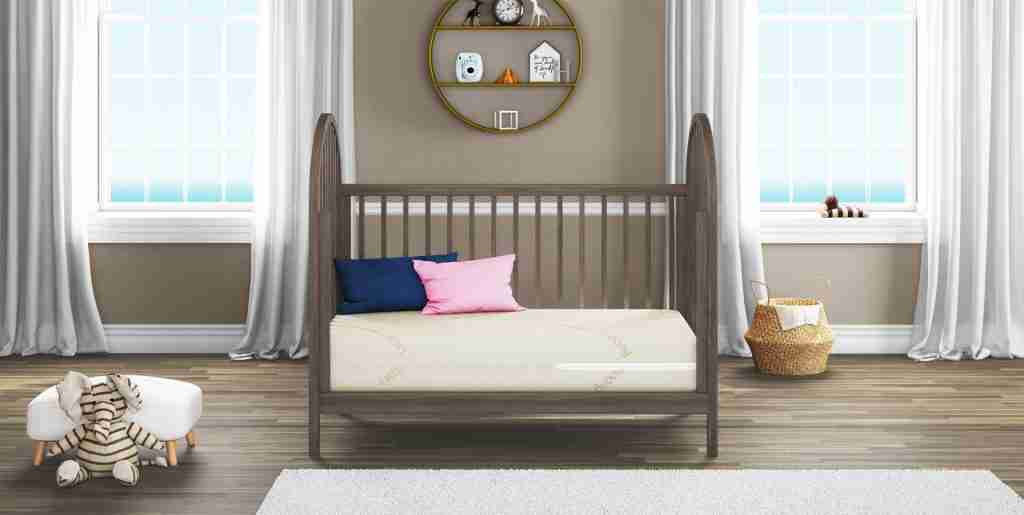 crib mattress height by age