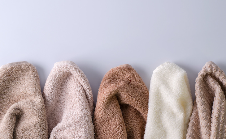 Layout of clean cotton towels in a row