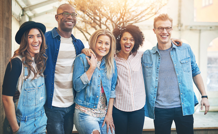 group of friends smiling to camera