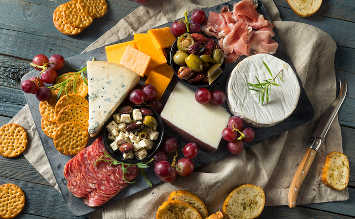 Gourmet Fancy Charcuterie Board with Meat Cheese and Grapes