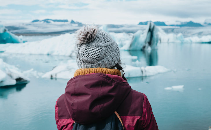 person looking at glaciers in Antarctica