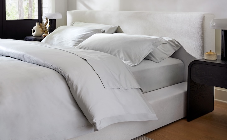 Elegant gray bedding on modern bed - saatva essential duvet cover