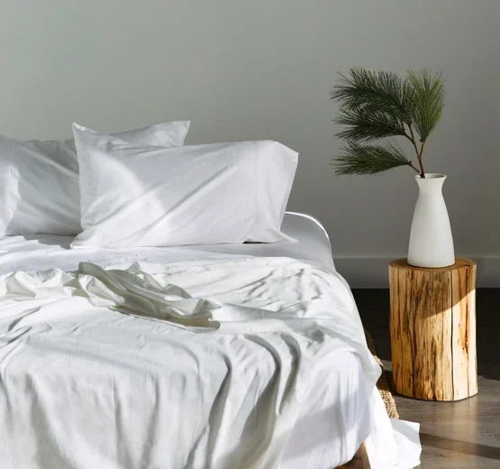 Saatva Signature Sateen Sheet Set Unmade Bed