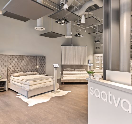 Saatva SF Interior with Tree and Check In Desk Right Side SlavaBlazerPhotography scaled