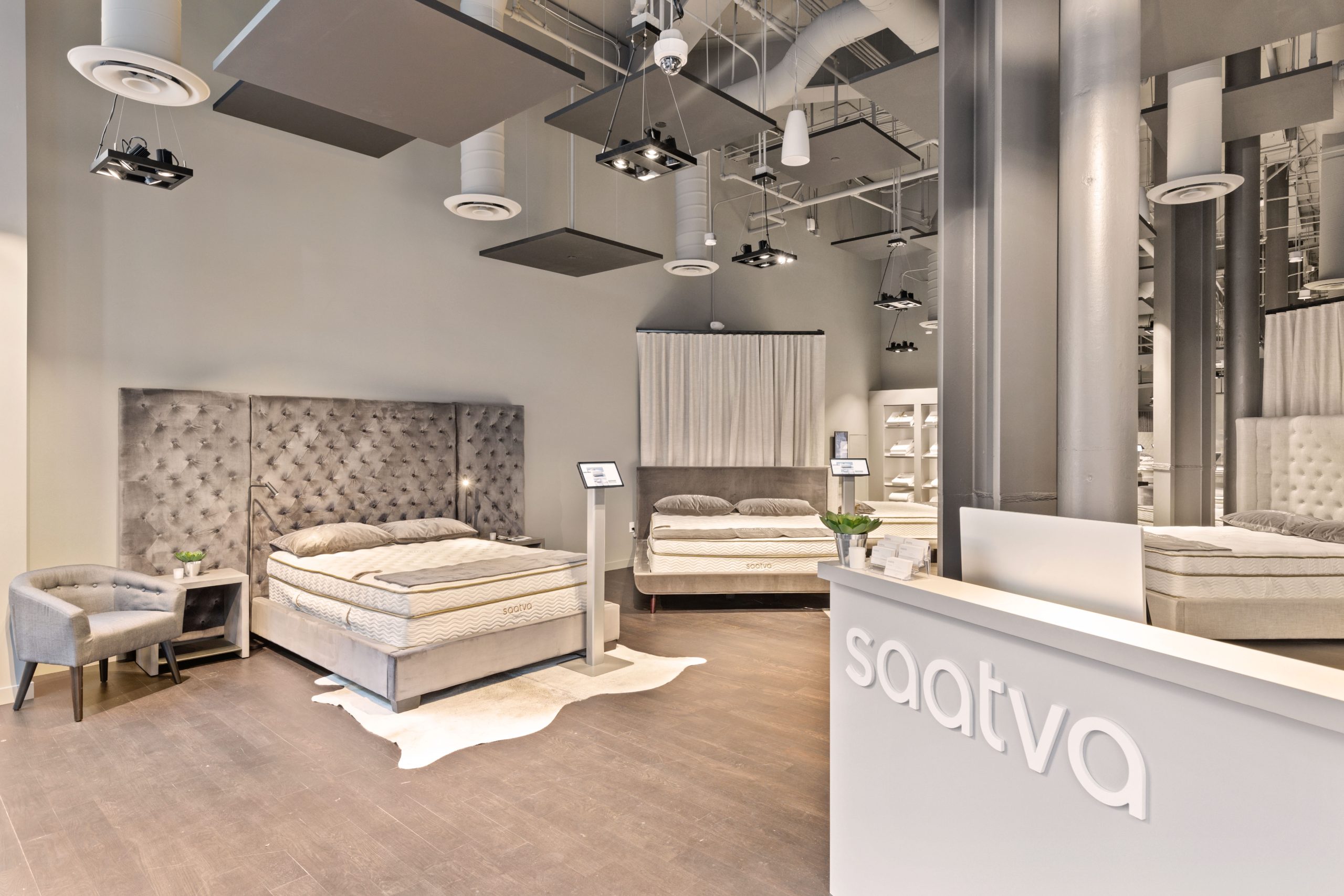 Saatva SF Interior with Tree and Check In Desk Right Side SlavaBlazerPhotography scaled