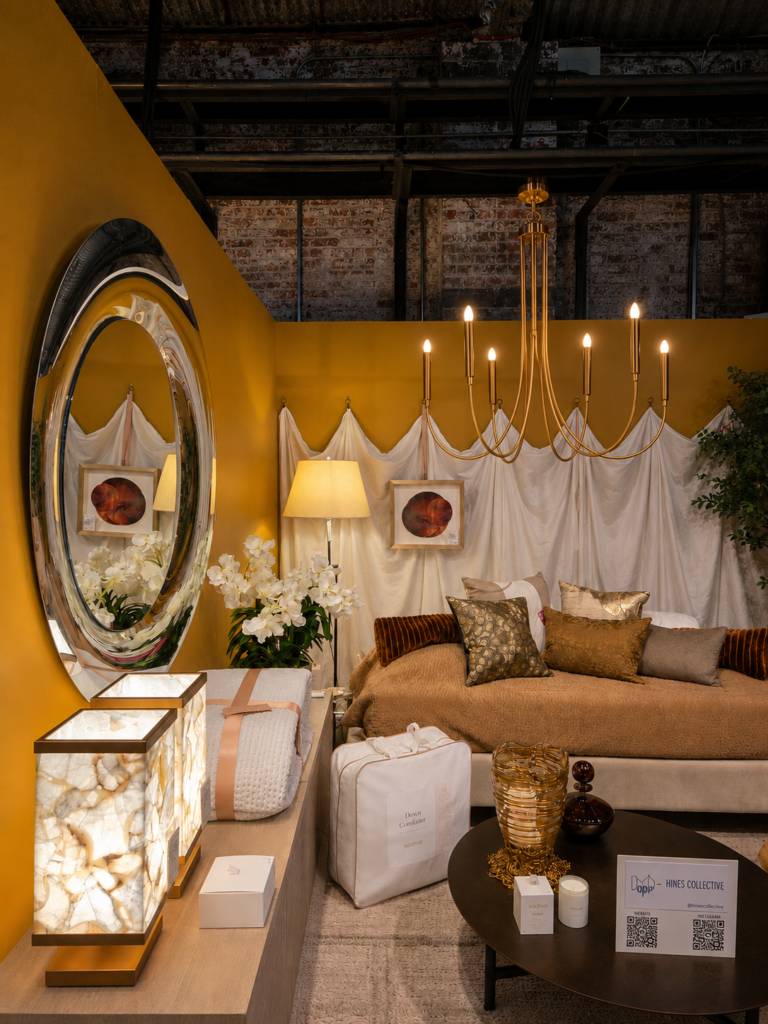 Saatva x Hines Collective for DOAD 2026 vignette featuring Saatva's new Nova bedside lamp, Atlas Nightstands, Velvet Pick-stitch Quilt, Vara Rug Saatva Classic Mattress and Santorini Bedframe