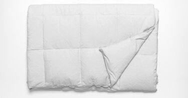 Saatva All-Year Down Alternative Comforter Side