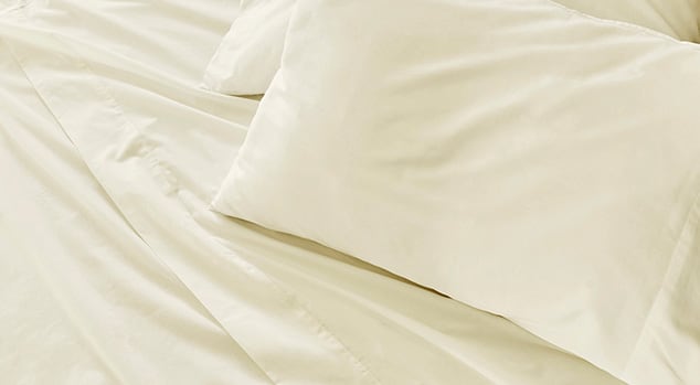 Saatva sheets with matching pillowcases.