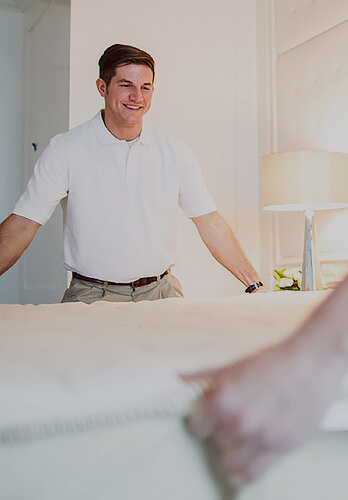 movers installing mattress